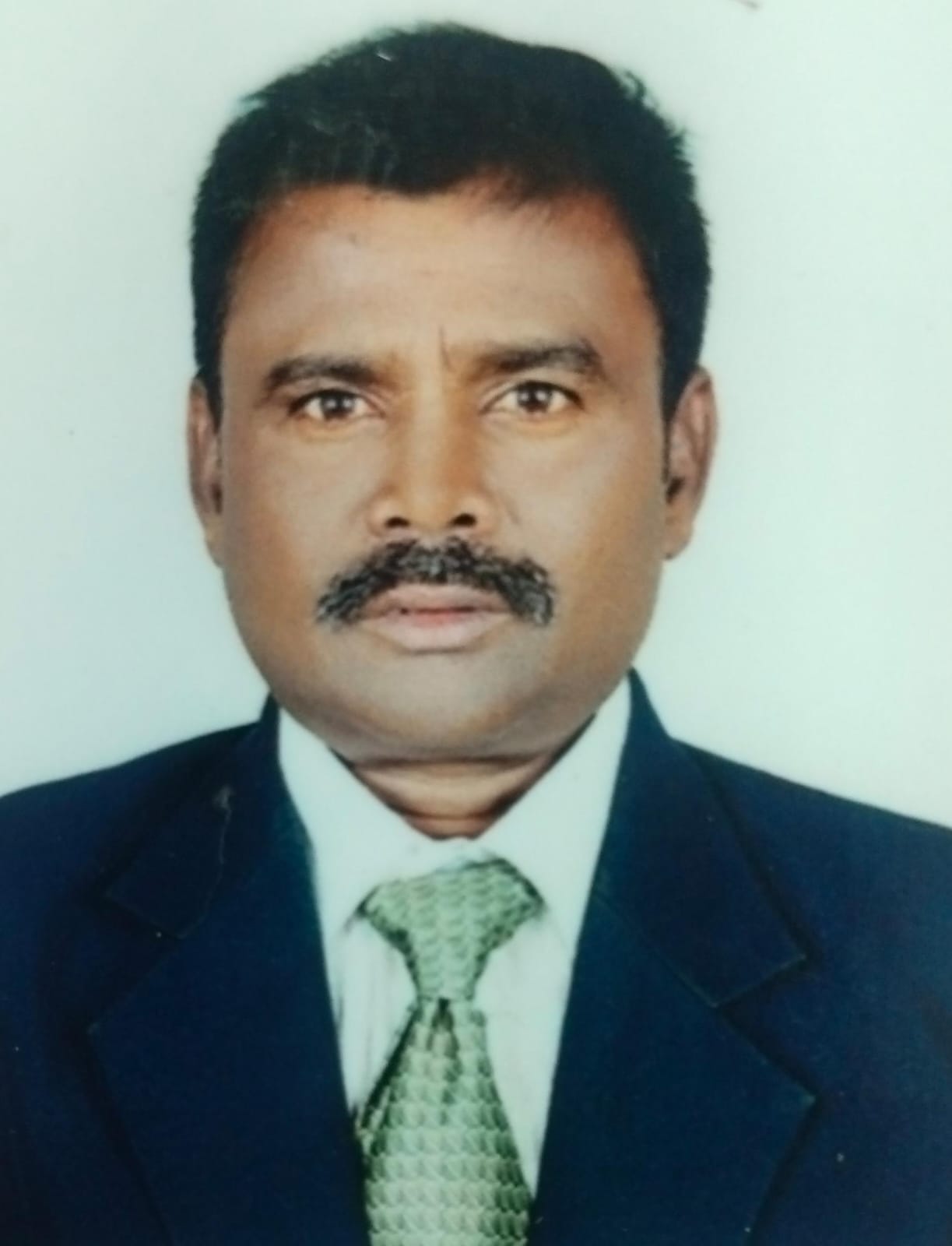 SHANMUGAM M.